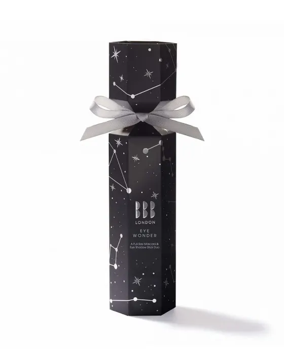 Tall hexagonal BBB London Eye Wonder carton printed with a black constellation pattern and tied with a grey ribbon bow