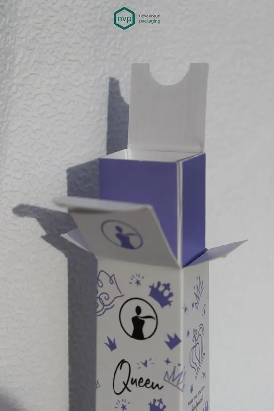 A Beauty Secrets carton opened to show the printed lilac liner and the fitment holding the bottle