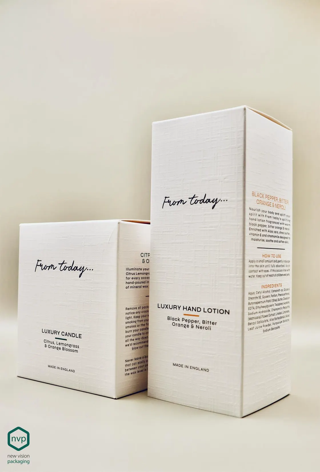 Two From Today cartons in embossed white board, one for a luxury candle and one for hand lotion