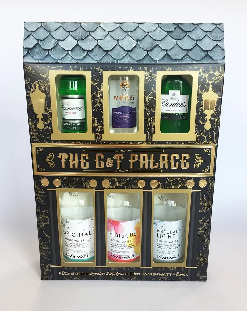 The G&T Palace gift carton, die-cut and printed as a shop front, presenting three gin miniatures above three tonic bottles