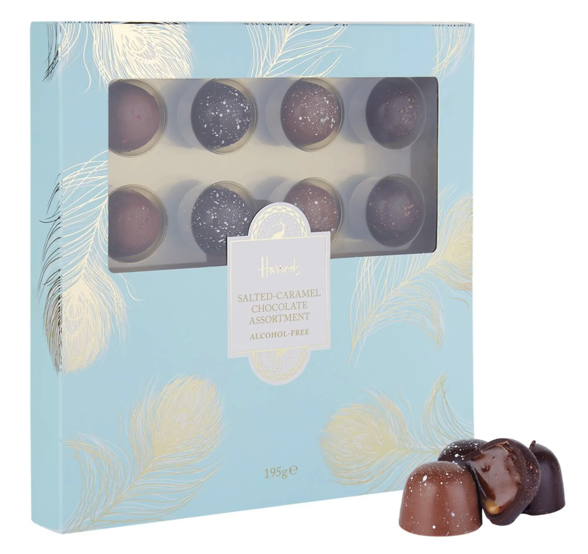 Pale blue Harrods chocolate box with gold feather print, opened to show the truffle selection