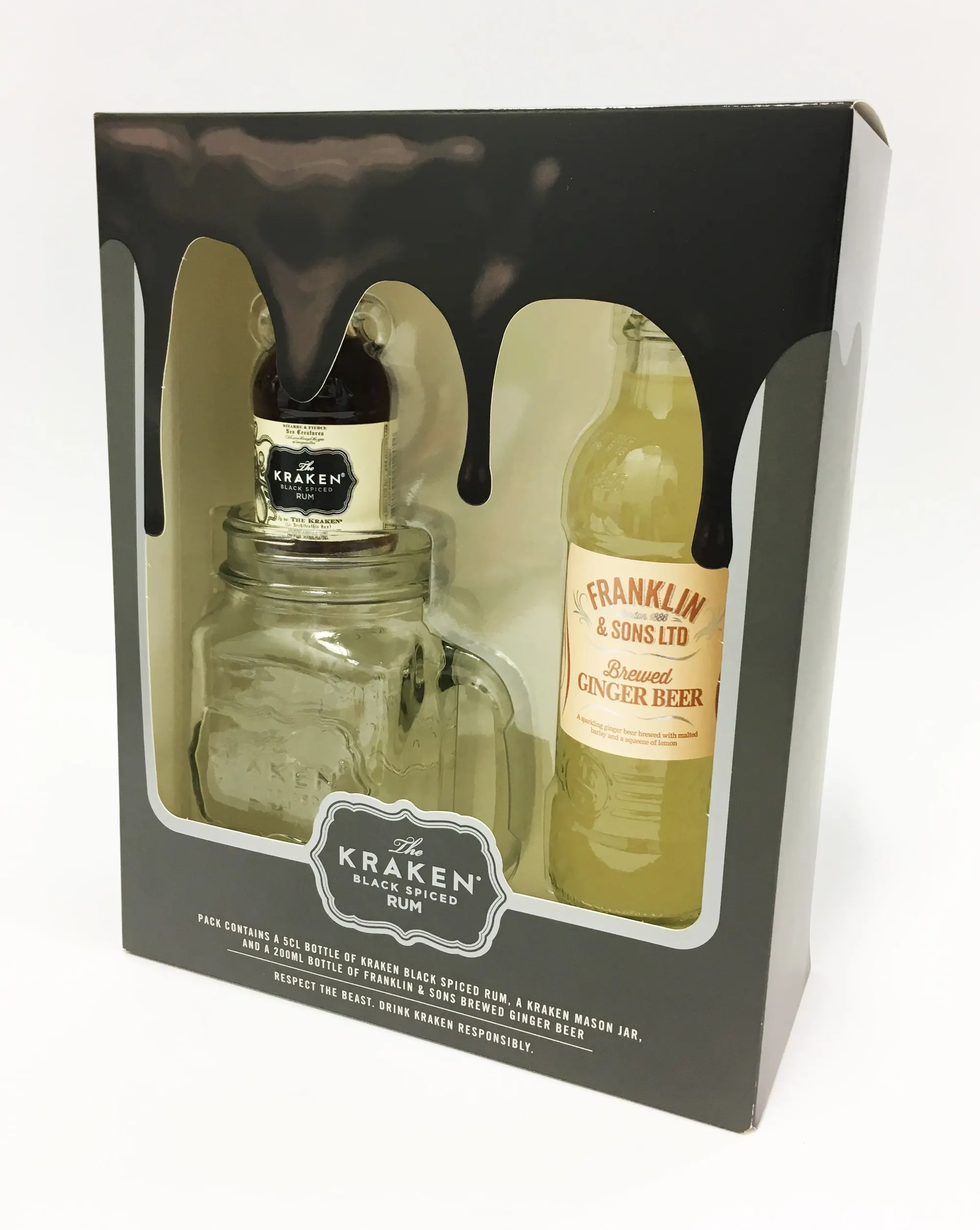 Kraken Black Spiced Rum gift carton with die-cut windows presenting a mason jar and a bottle of ginger beer