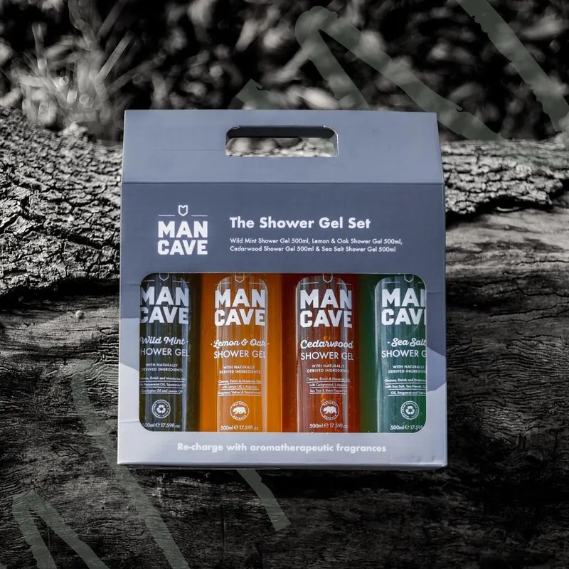 ManCave shower gel set in a printed corrugated carrier holding four bottles