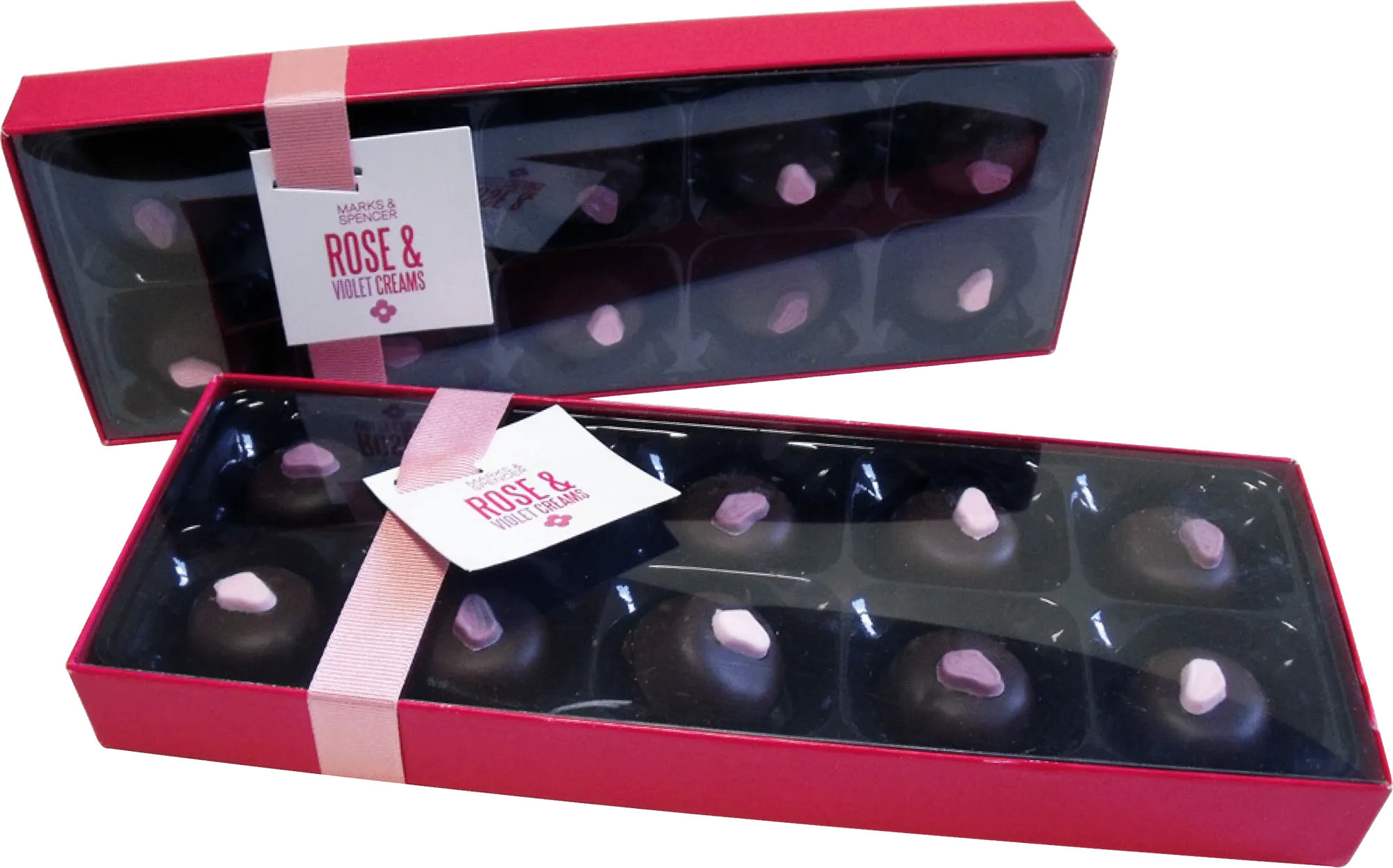 Rose and violet creams presented in dark vacuum formed insert trays inside two pink cartons